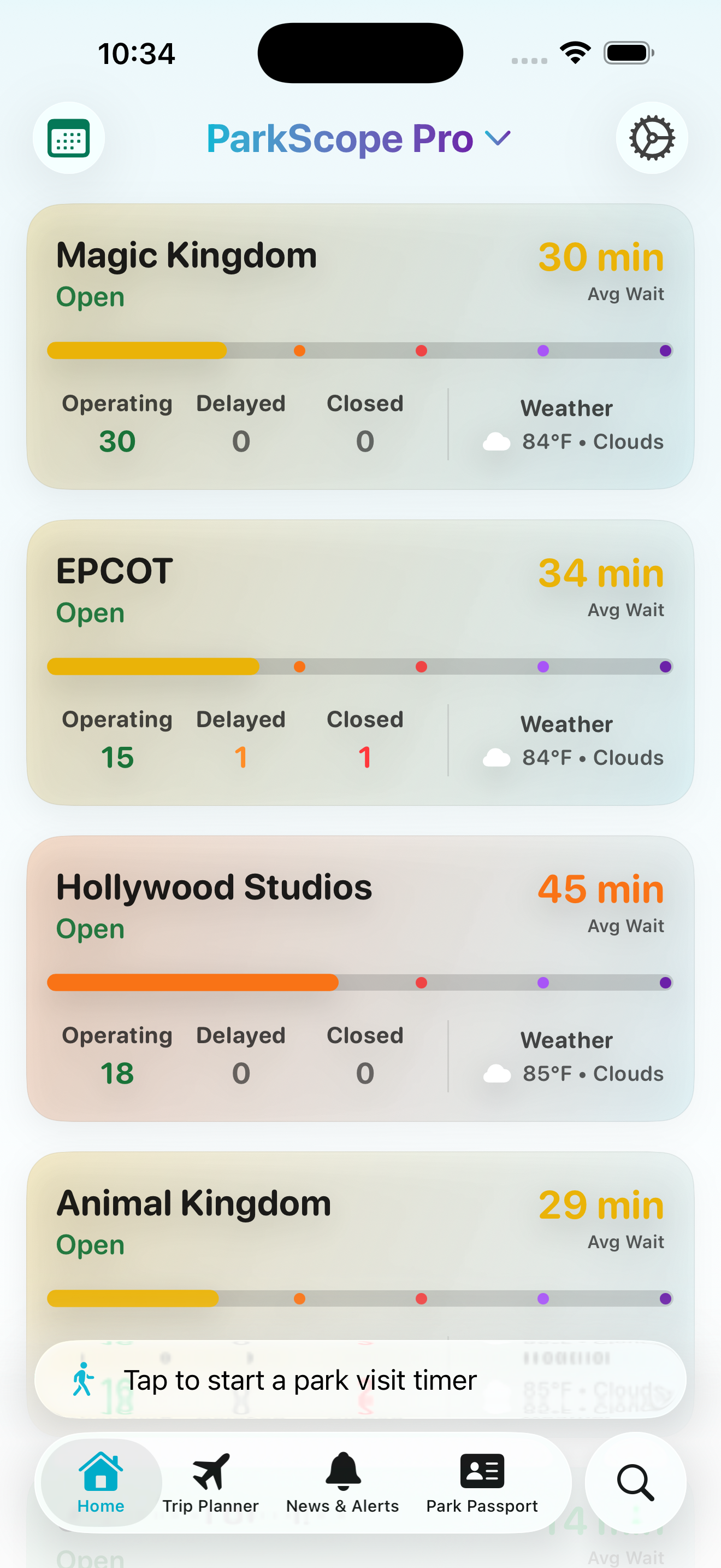 ParkScope iPhone dashboard showing park cards and wait time summaries